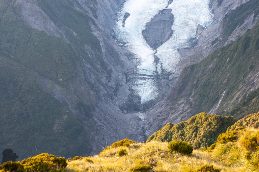 Alex Knob, the Peak Stands in front of Franz Josef Glacier Franz Josef Glacier