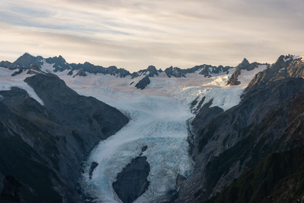 Alex Knob, the Peak Stands in front of Franz Josef Glacier Franz Josef Glacier