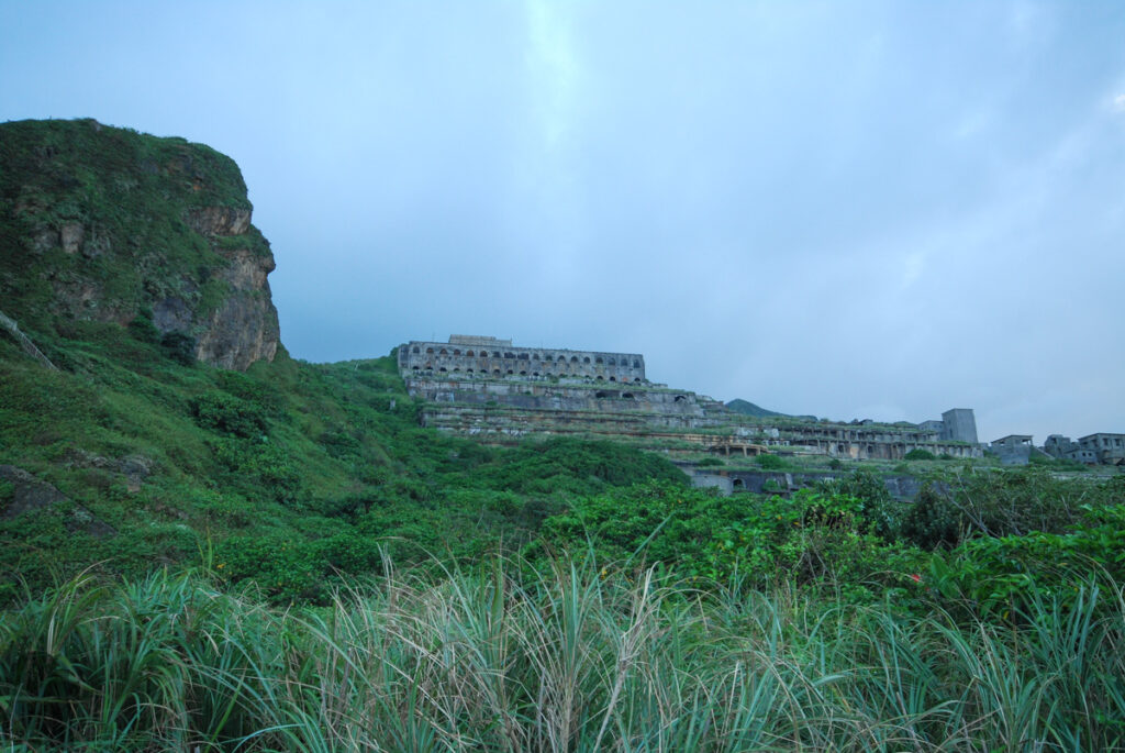 C-shaped Bay in Shuinandong (水湳洞), a Site to Capture the Light Trails by the Yinyang Sea (陰陽海) Historic Shuinandong Smelter or remains of the 13 Levels