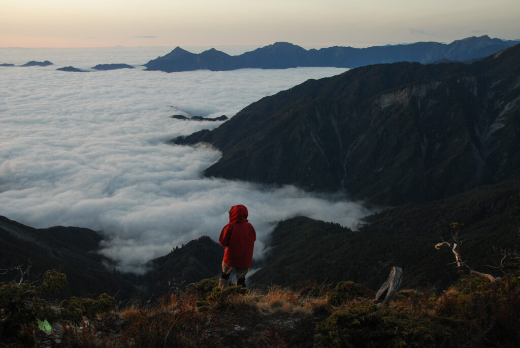 The Death Ridge (死亡稜線), the Climb on a Razor-Sharp Ridge between North Section 1 and North Section 2, Central Mountain Range a hiker overlook the scene at Sky Campground