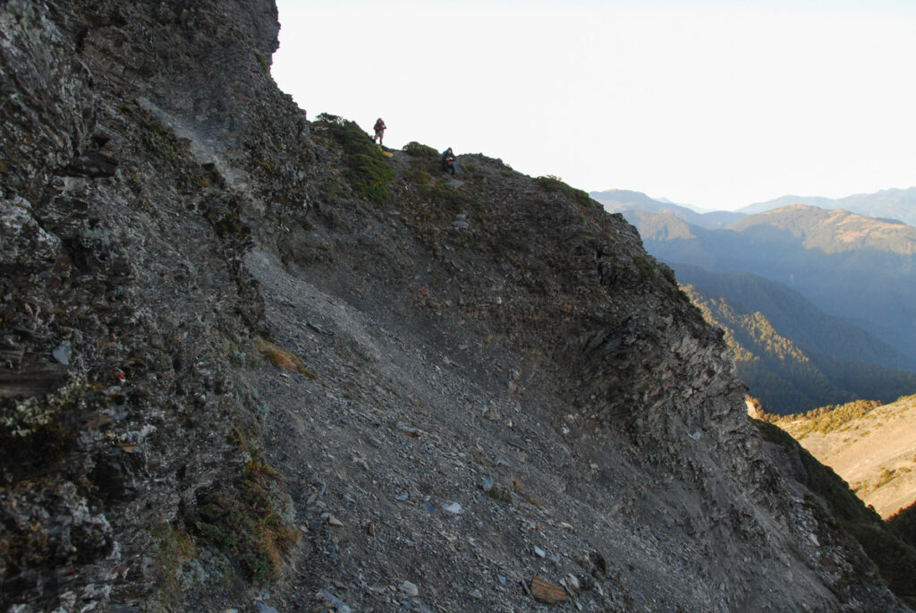 The Death Ridge (死亡稜線), the Climb on a Razor-Sharp Ridge between North Section 1 and North Section 2, Central Mountain Range my teammates waiting on the other side of the steep scree slope