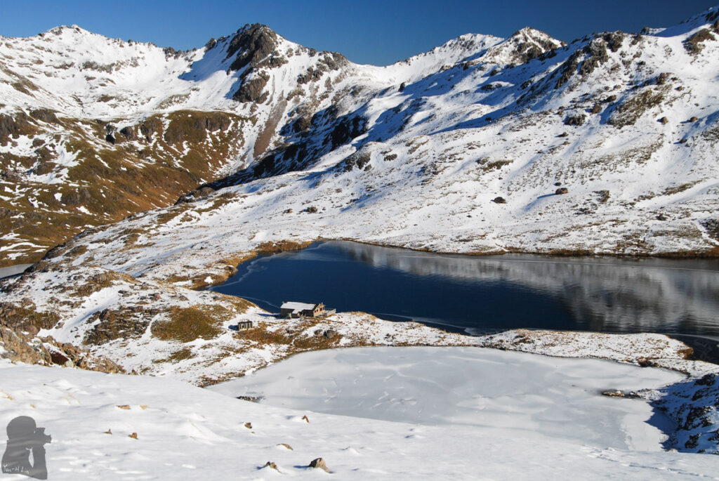 Lake Angelus, the hut and a smaller frozen lake