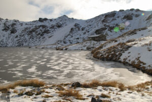The “main lake” started icy when we left the hut in the morning.