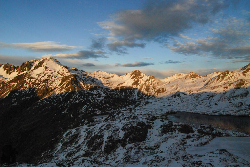 Morning sun lit Angelus Peak on the left.
