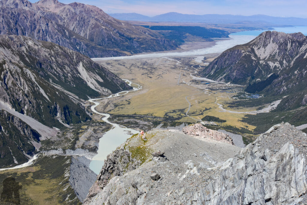 Sefton Bivouac (Sefton Bivvy), the Climb along the Precipitous Trail above Mount Cook Village A truly amazing view from Mount Cook Village to Lake Pukaki