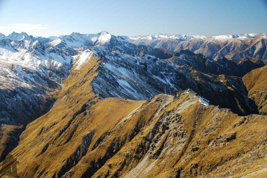 Sentinel Peak, the Summit on the Serrated Ridge Overlooks Lake Hāwea and Lake Wānaka Numberless ridges and peaks in sight