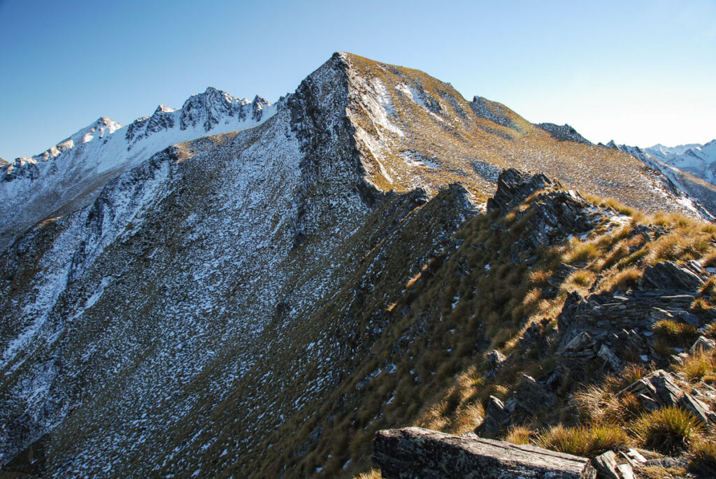 Sentinel Peak, the Summit on the Serrated Ridge Overlooks Lake Hāwea and Lake Wānaka Sentinel Peak appeared behind the blade-like ridge.