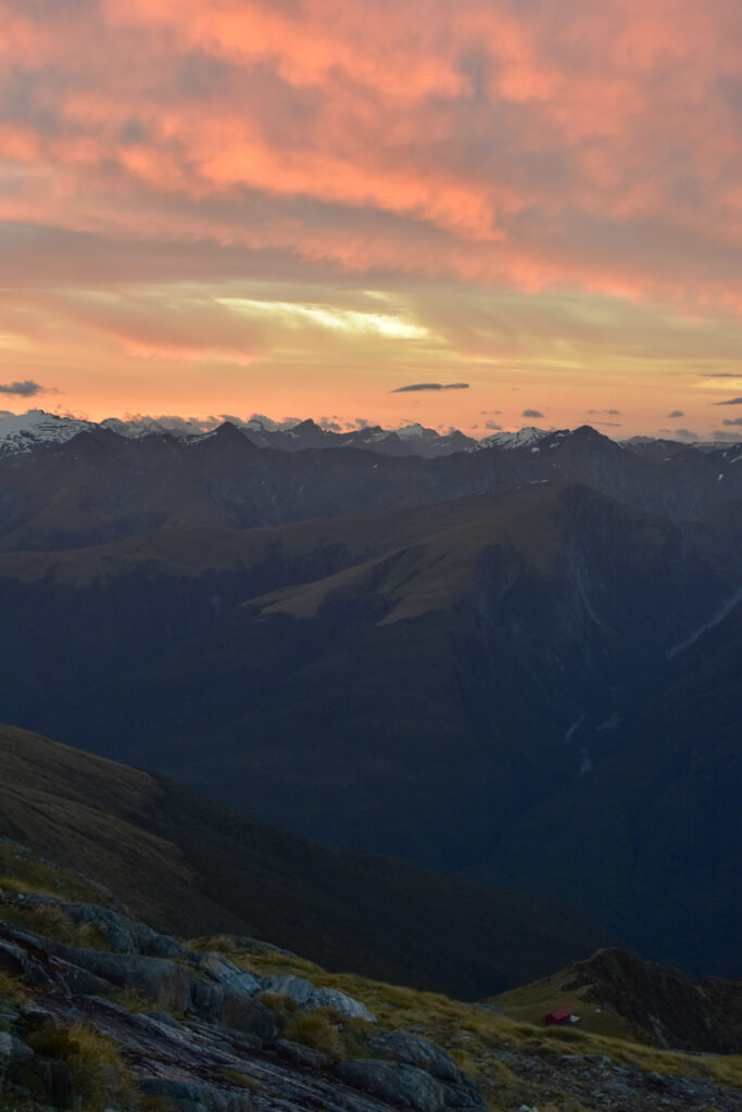 Beyond the Brewster Hut, the Breathtaking Mt. Armstrong and Terminal Lakes of Brewster Glacier The dusk above Brewster Hut