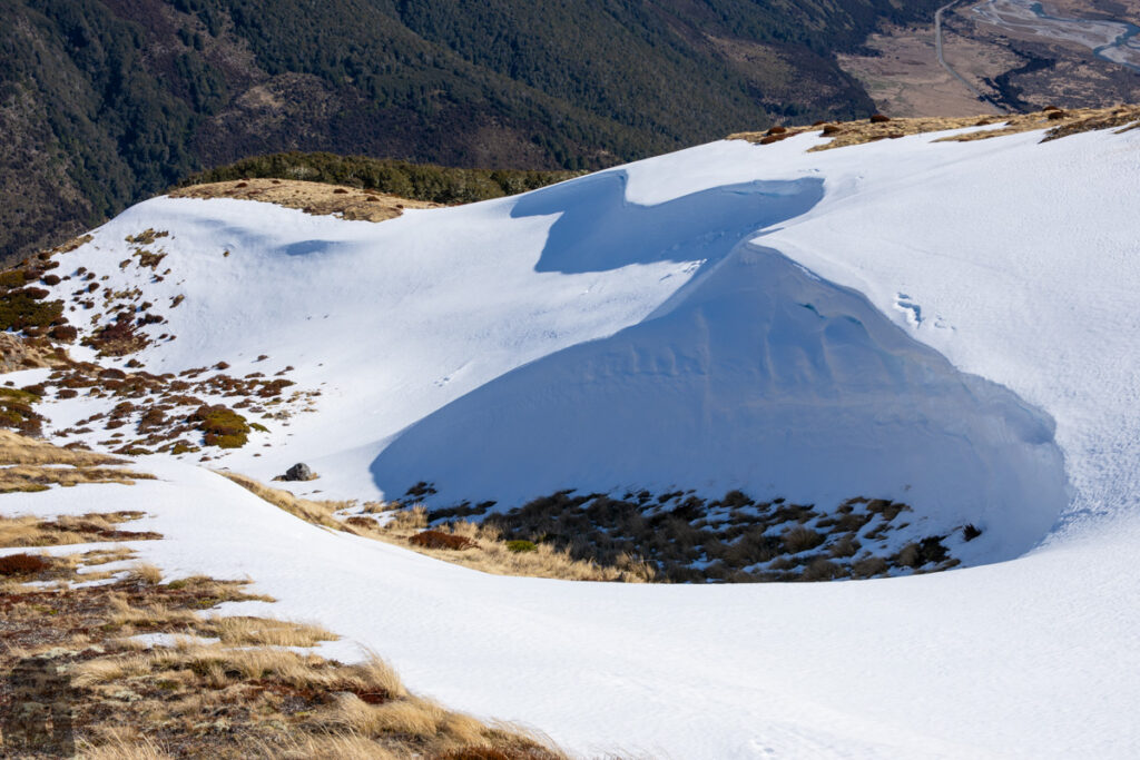 Faust in Snow; Camping on its Snowy Ridge Creamy snow piled up.
