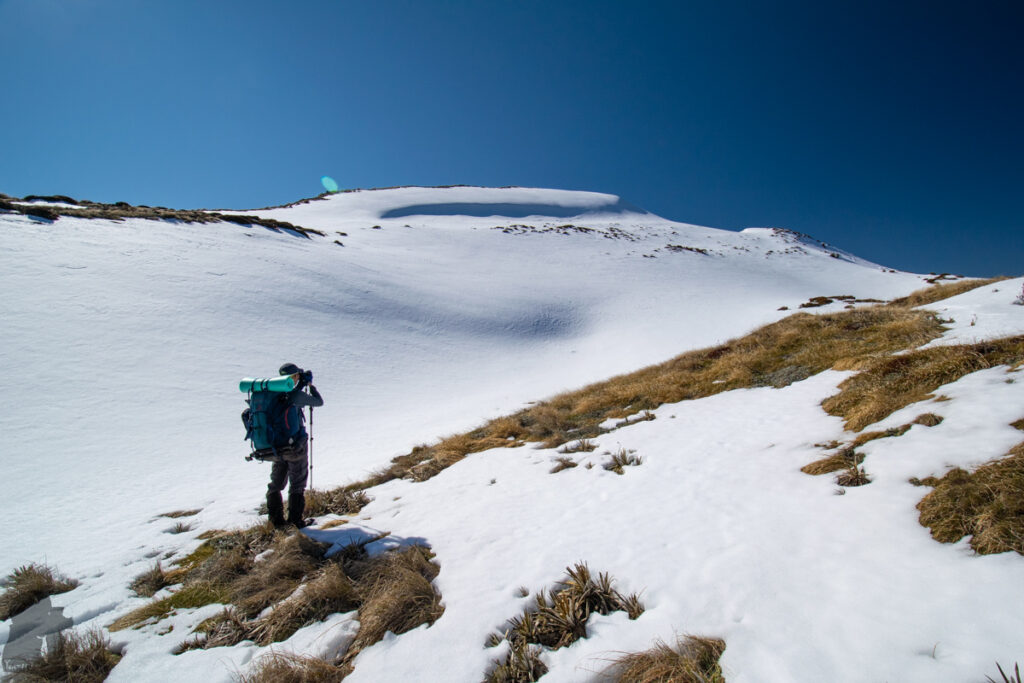 Faust in Snow; Camping on its Snowy Ridge That was me, turning on the photography mode. Photo by my partner.