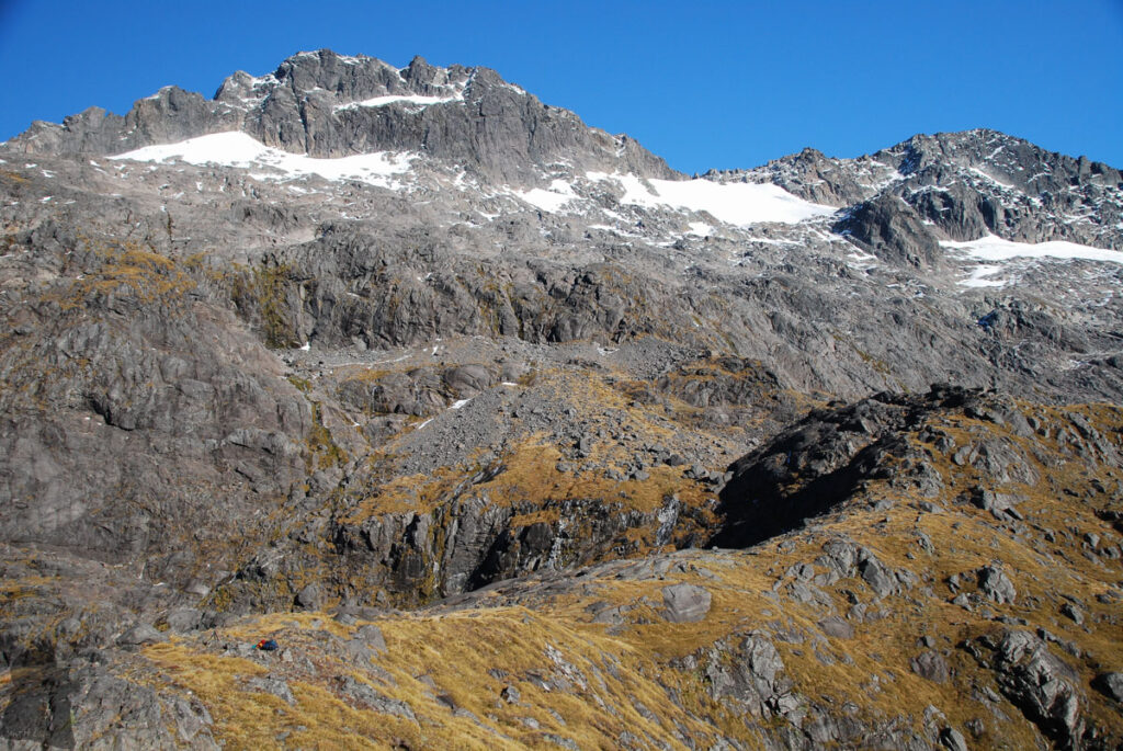 Gertrude Saddle Route, My Favorite Trail to View the Breathtaking Fiordland Mt. Talbot and Traverse Pass on the right at the end of the snowy slope, the direction I was moving.