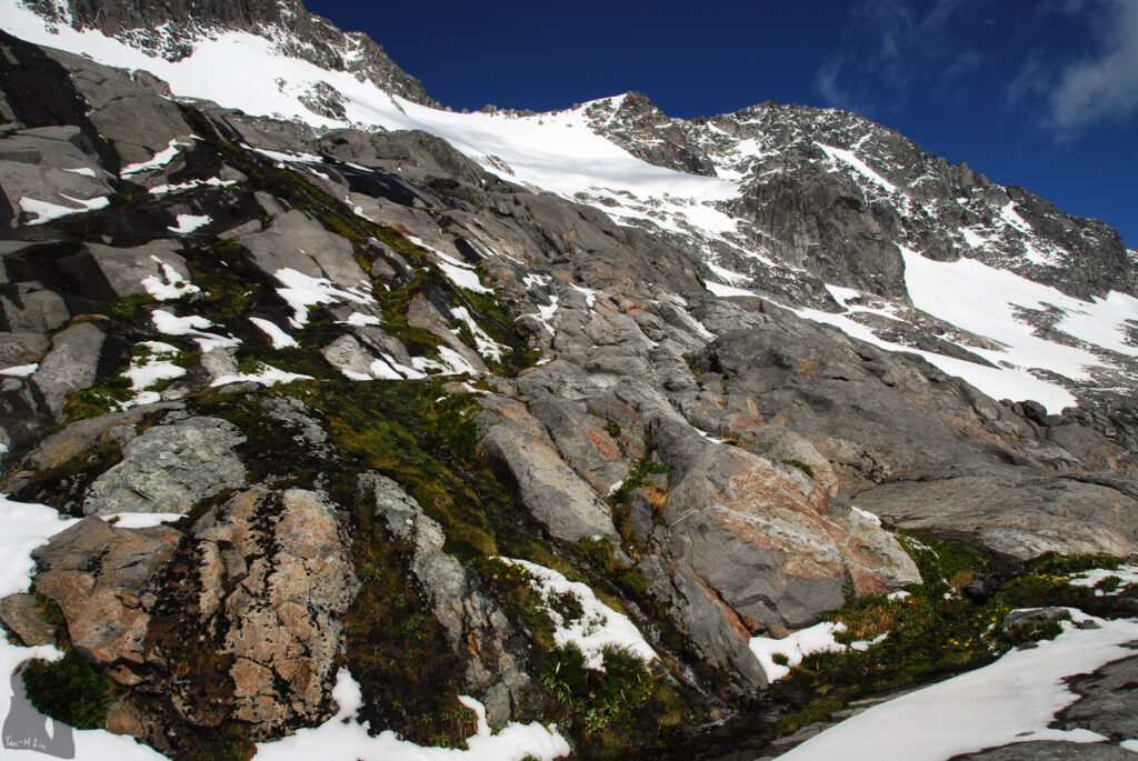 Gertrude Saddle Route, My Favorite Trail to View the Breathtaking Fiordland Approaching Traverse Pass; the rock with flowing water was very slippery.