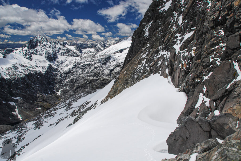 Gertrude Saddle Route, My Favorite Trail to View the Breathtaking Fiordland Reaching underneath the peak of Mt. Talbot; the only marks on snow were my footprints.
