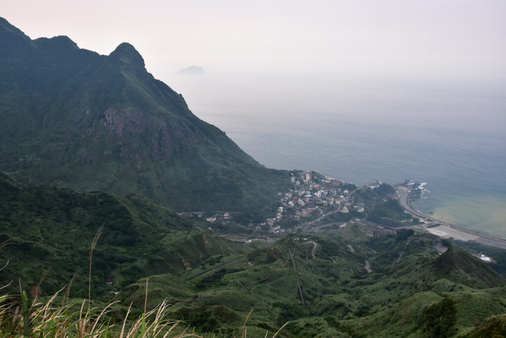 Jiufen (九份) and Jinguashi (金瓜石) the Former Mining Towns of Distinct Vibes. The three giant exhaust chimneys coming from downhill