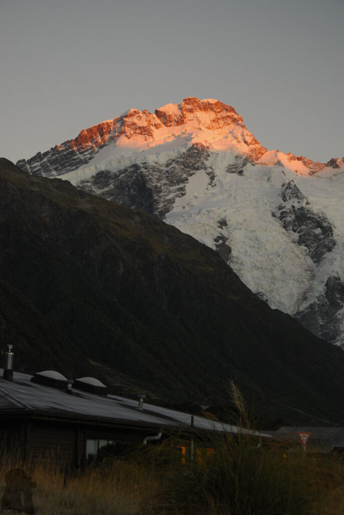 Aoraki / Mount Cook, the Busiest Village beneath the Highest Peak Mt. Sefton towers above the village