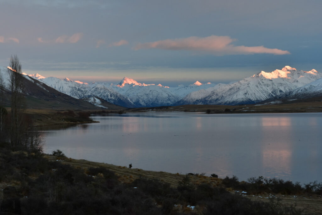 Mt. Guy & Lake Clearwater, Climb to the Vivid Snowy Scenery of Ashburton Lakes Snow-capped ranges are the gorgeous backdrop of Lake Clearwater.
