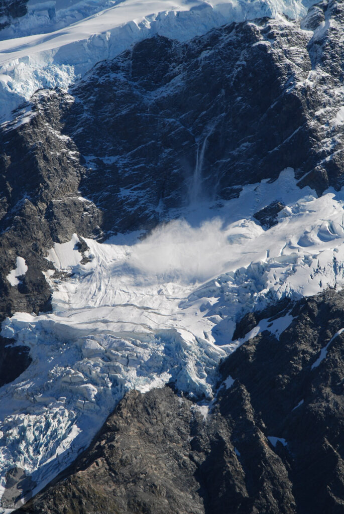 Mueller Hut Route & Mount Ollivier, Climbing High for the Panorama of Hooker Valley and Mount Cook A “small?” avalanche on the glacier