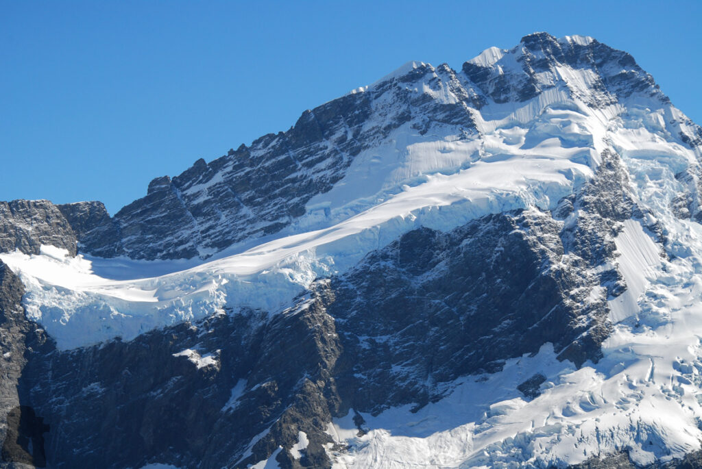 Mueller Hut Route & Mount Ollivier, Climbing High for the Panorama of Hooker Valley and Mount Cook Shinning white ice on Mt. Sefton