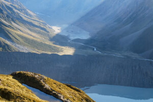 The sun lit Hooker Lake behind the moraine wall.