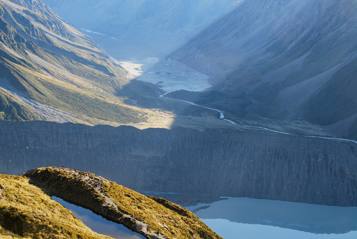 The sun lit Hooker Lake behind the moraine wall.