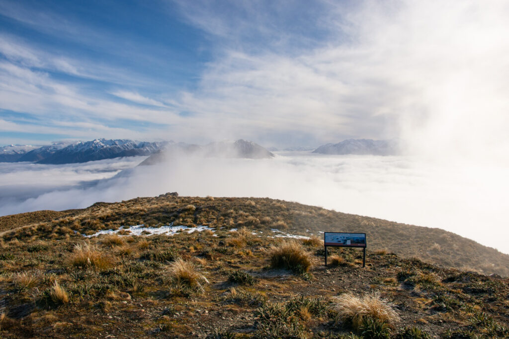 Peak Hill, the Gentle Hill Flanked by the Peaceful Lake Coleridge and Braided Rakaia River Cloud just below the top of Peak Hill