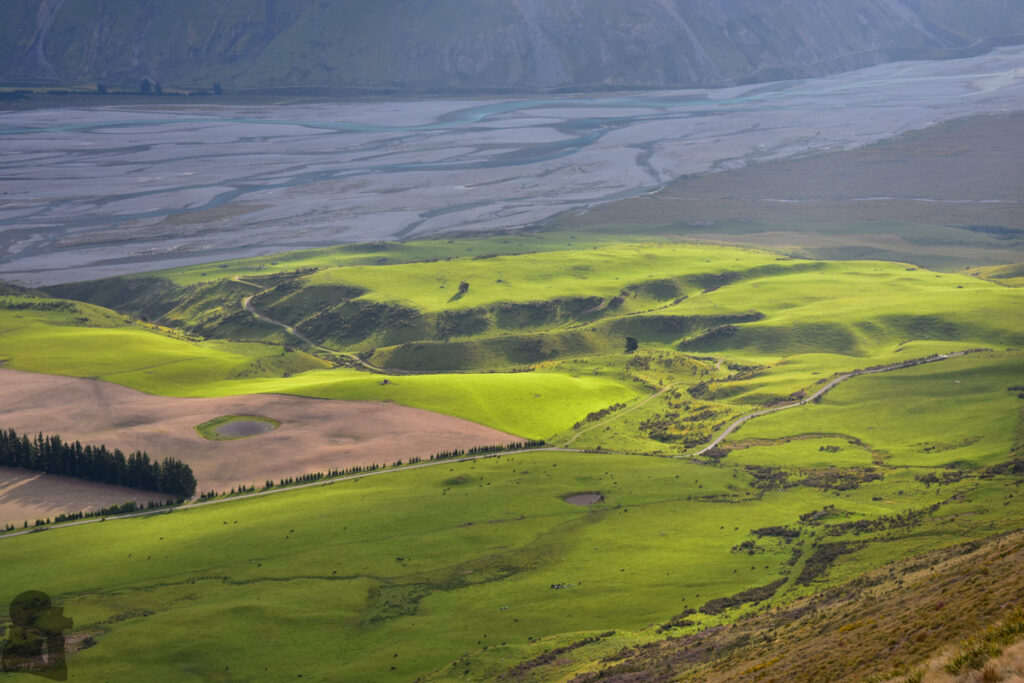 Peak Hill, the Gentle Hill Flanked by the Peaceful Lake Coleridge and Braided Rakaia River Graceful meadow by the Rakaia River