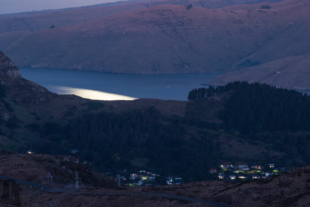 Te Moenga-o-Wheke / The Tors, the Prominent Peak on Port Hills for Viewing the Panorama of Canterbury Moon lit the water.
