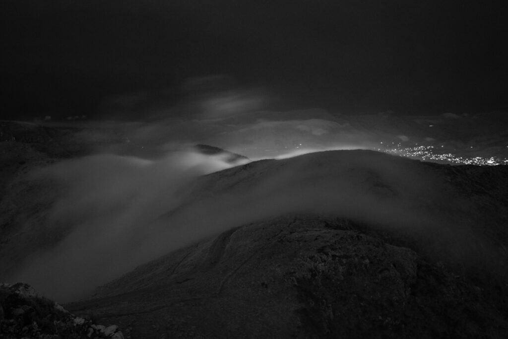 Te Moenga-o-Wheke / The Tors, the Prominent Peak on Port Hills for Viewing the Panorama of Canterbury Veiled hill; a sign for the home time