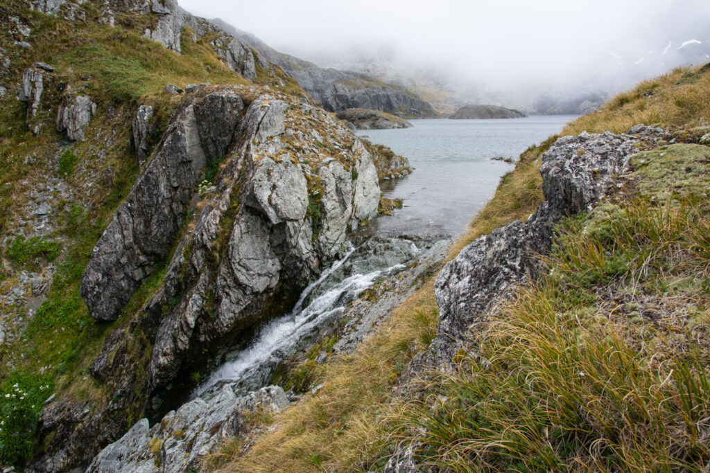 Valley of the Trolls / Lake Wilson, the Best Hidden Destination via Routeburn Track Lake Wilson's outlet