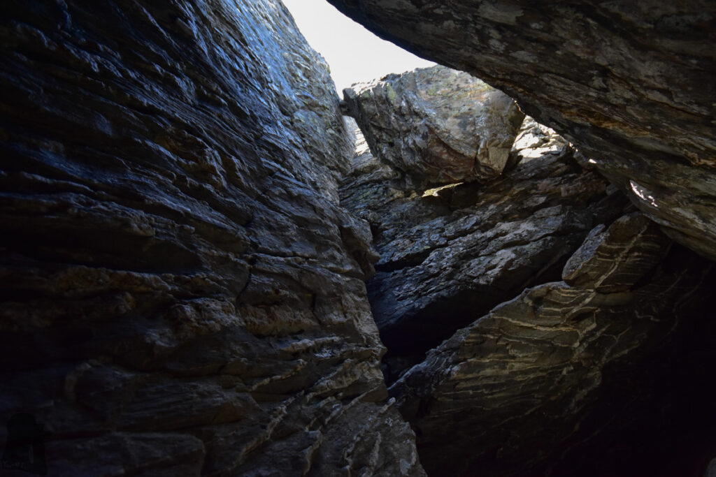 Camping on the Ridge of The Remarkables, Under the Majestic Double Cone a shed by boulders