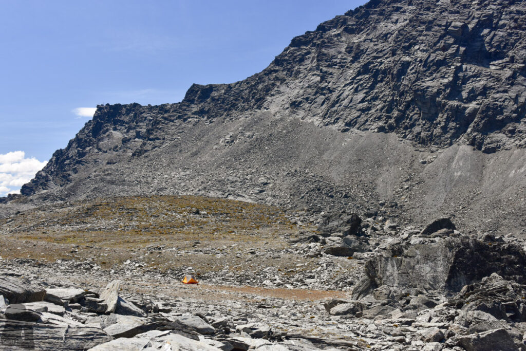 Camping on the Ridge of The Remarkables, Under the Majestic Double Cone My little tent dwarfed by the base of Double Cone