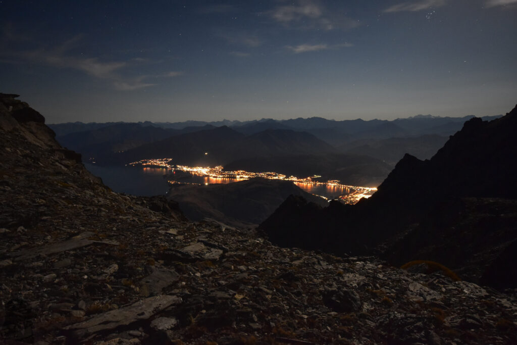Camping on the Ridge of The Remarkables, Under the Majestic Double Cone City light in Queenstown