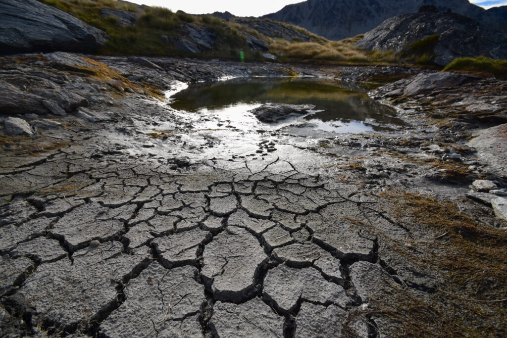 Camping on the Ridge of The Remarkables, Under the Majestic Double Cone cracked mud