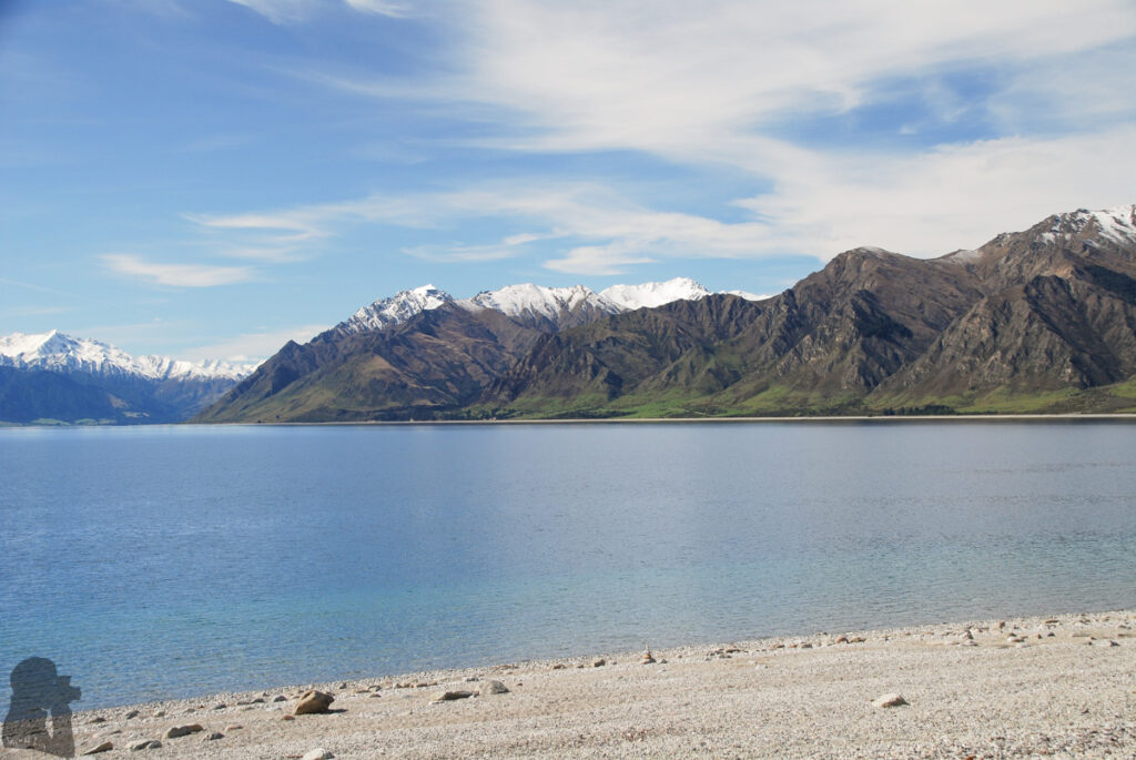Corner Peak, the Prominent Pyramid Towering up above Lake Hāwea Corner Peak; view from the southern shore of Lake Hāwea
