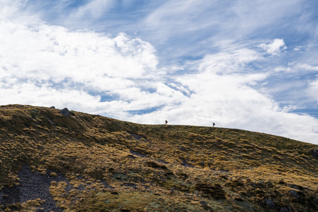 Camping in the Head of Deer Valley, via Lewis Tops Track People rushed to their destination.