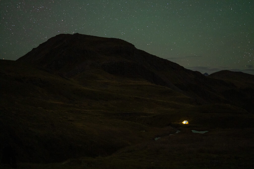 Camping in the Head of Deer Valley, via Lewis Tops Track A lone tent in the landscape