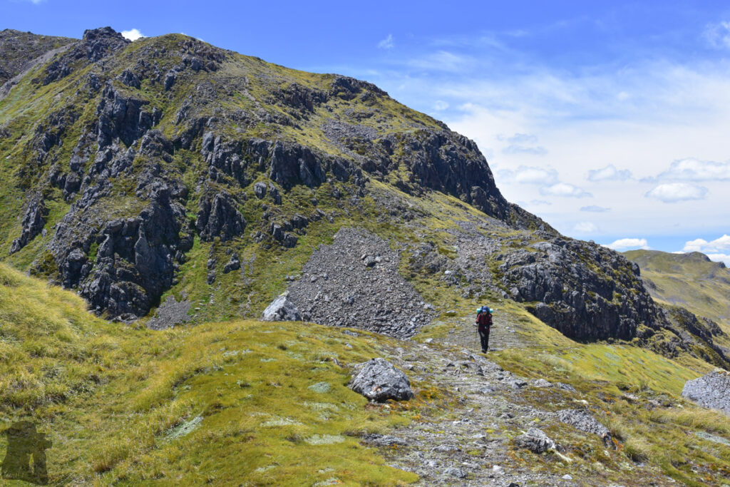 Camping under The Apprentice, via Lewis Tops Track Walking down Lewis Tops ridge