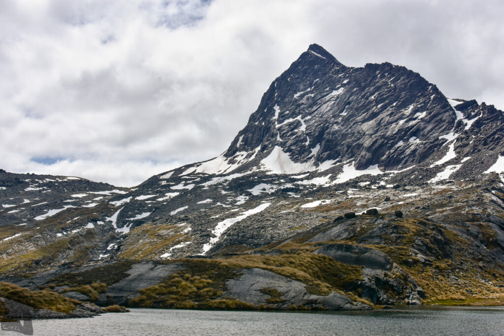 Wye Creek Basin, The Remarkables, Camping by the Gorgeous Lake in a Hidden Valley The massive and solid body of Double Cone resembles a sail.